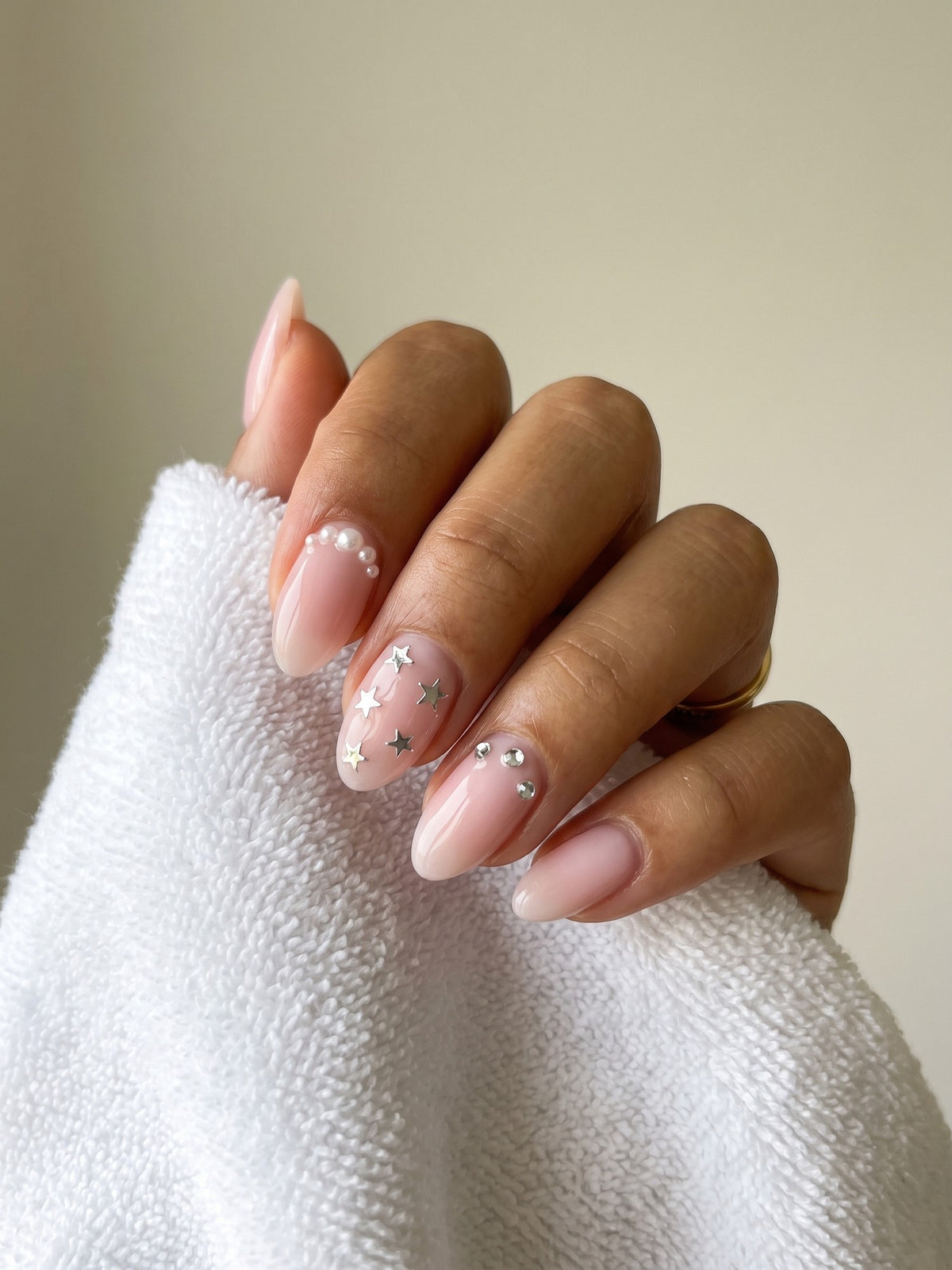 Pearl, star and crystal nail add-ons at Kingdom of Beauty, Abu Dhabi