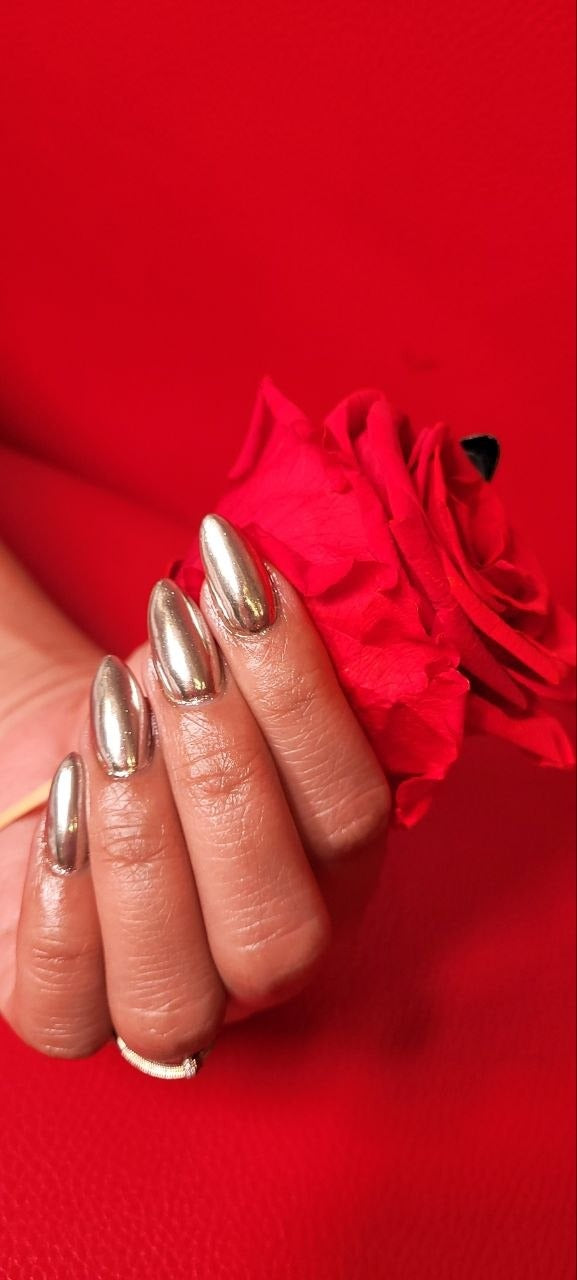 Silver chrome almond nails at Kingdom of Beauty, Abu Dhabi