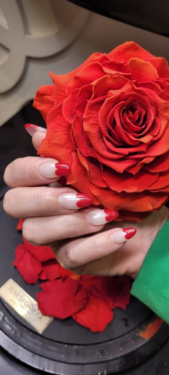 Red heart French tips nail art at Kingdom of Beauty, Abu Dhabi