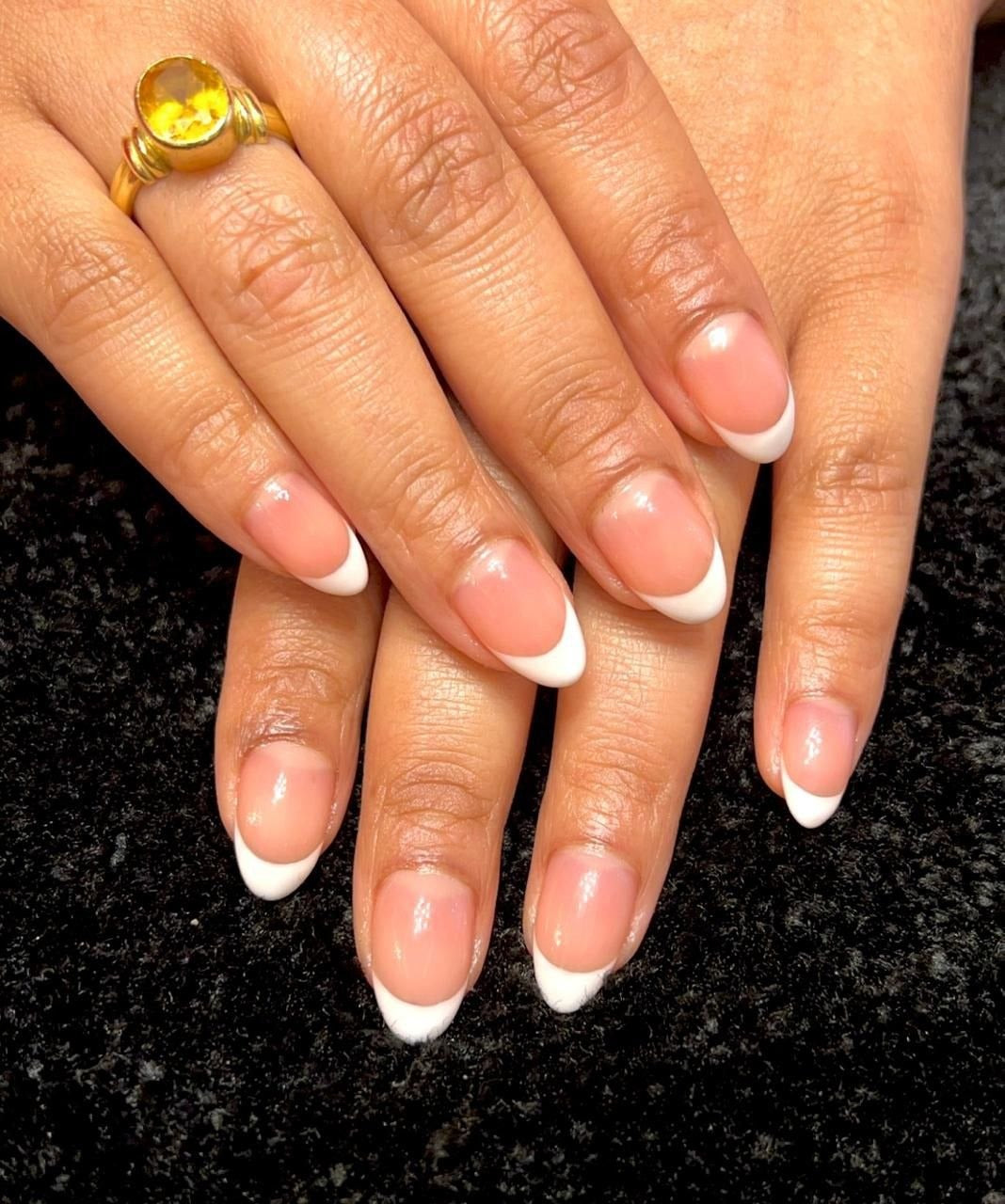 Classic white French manicure at Kingdom of Beauty, Abu Dhabi